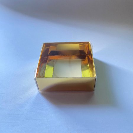 علب 8.8.3 قاعدة ذهبي وجه شفاف